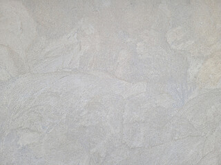 Concrete wall covered with gray cement mortar. Repair, construction of buildings.Horizontal design on cement and concrete texture for pattern and background.