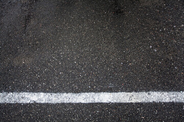 Warning markings, restrictive white stripe in the parking lot. An image for your design or creative illustrations about service and protection.