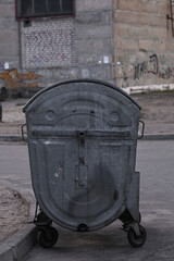 metal garbage container box. Outdoors.