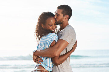 My love for you knows no limits. a young couple enjoying some quality time together at the beach.