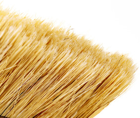 natural paint brush on a white background with a wooden handle