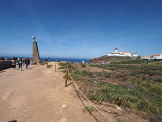 Fototapeta na wymiar Lighthouse and monument on the westernmost cape of Europe