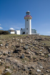 Fototapeta na wymiar Lighthouse at Torneady point - aranmore Island - Arainn Mhor - Donegal - Ireland