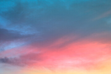 Naklejka na ściany i meble Pink sky and clouds background at dusk.