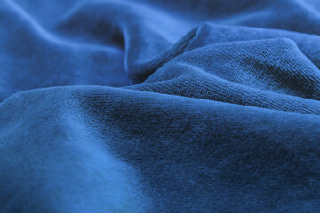 Fototapeta premium Beautiful dark blue velvet fabric.
