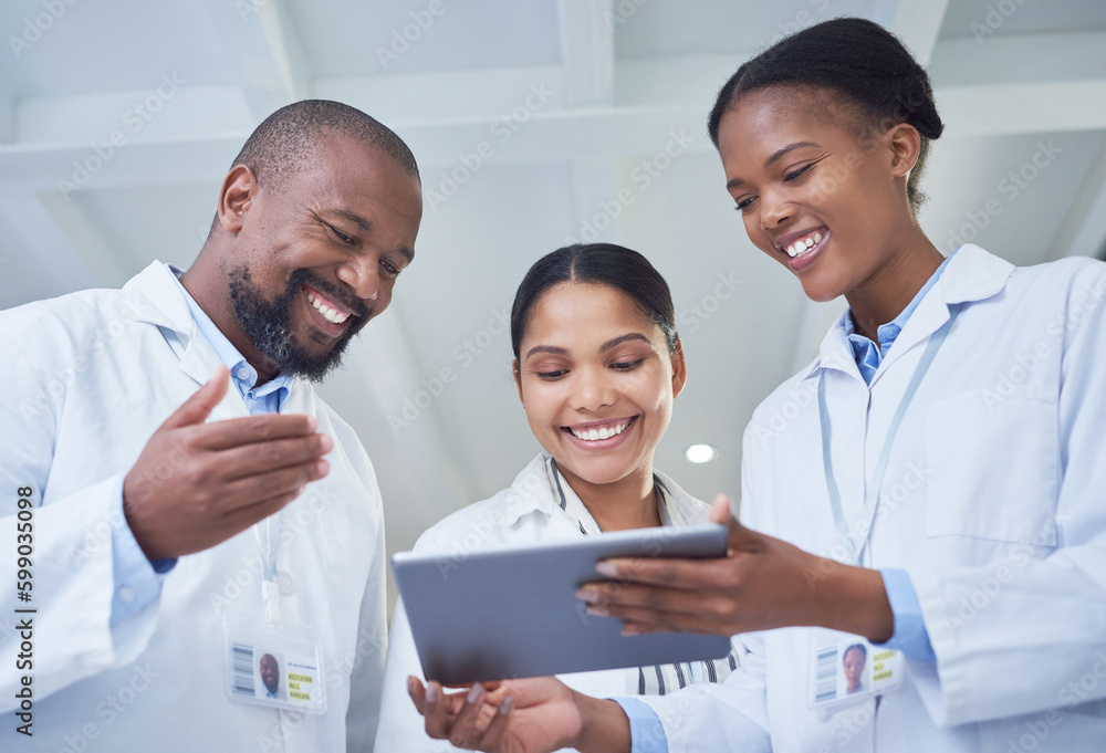 Poster Banding together to bring about change. a group of scientists using a digital tablet in a laboratory.