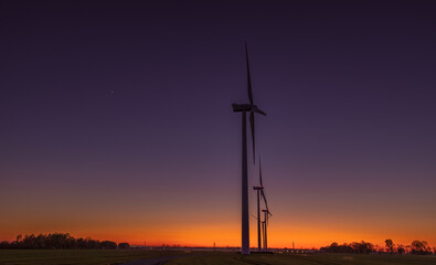 Fototapeta premium wind turbine at sunset