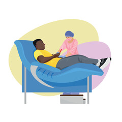 African-American man donating blood in hospital