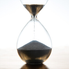 hourglass on a light background. time and minute measurement