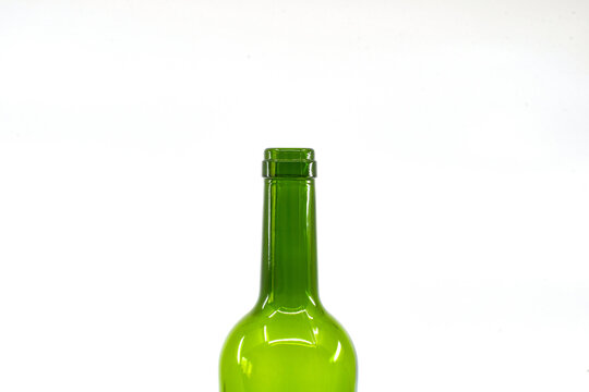 Top of an empty wine bottle isolated against a plain white background. Copy space.