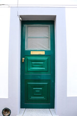 Typical Portuguese facade with colorful green door