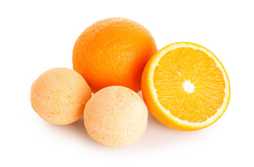 Bath bombs with orange on white background