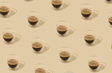 Creative trendy pattern made of coffee on pastel background. Minimal concept.
