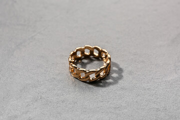 Beautiful ring on grey background
