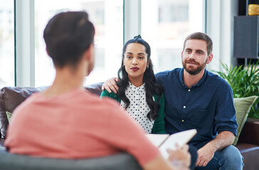 For sound advice, ask the specialist. a young couple having a consultation with a specialist.