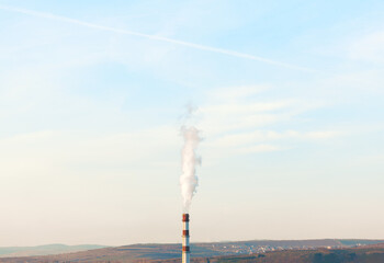 Smoke Pipe Of A Chemical Plant .  Industrial pipe with white smoke 