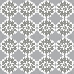 An ornate and graceful floral pattern in gray and white with art deco ornaments, damask and geometric.