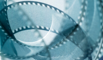 background with shadows from the film strip on a gray background .abstract background baner with...