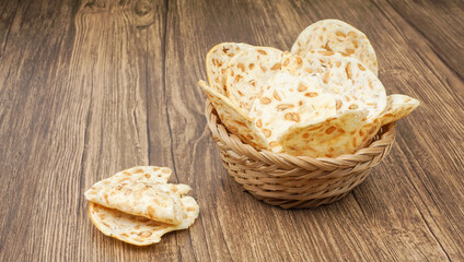 Tempe or Keripik Tempe. Tempeh chips a typical Indonesian food. It's served on bamboo basket