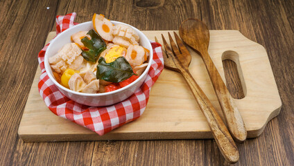 Indonesian food from Bandung, West Java (Seblak). This food contains, crackers, and noodles, with a spicy sauce.