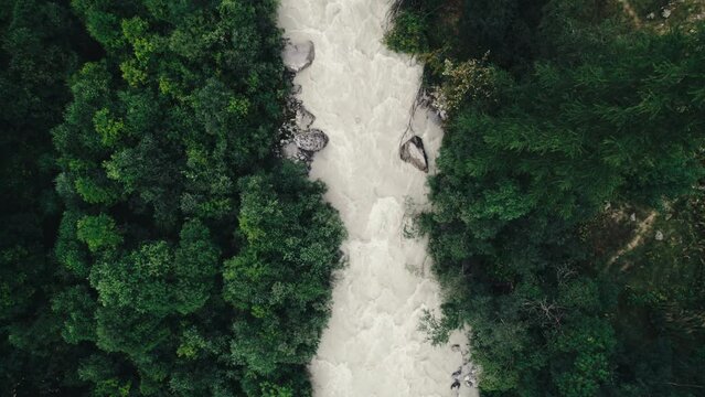 Aerial shot of a river in the Alps shot from Ailefroide in France with a 4K drone