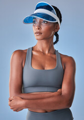 It takes a steady mind to stay on the path to success. Studio shot of a fit young woman posing against a grey background.