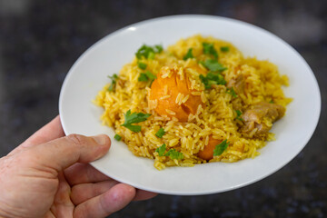 Traditional recipe for rice with chicken and pequi (caryocar brasiliense)