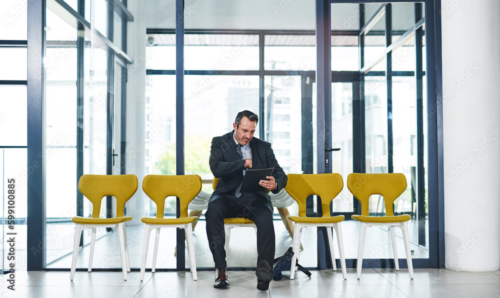 Poster my resume looks good i should be fine. full length shot of a handsome mature businessman looking at 