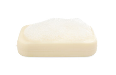 Soap bar with fluffy foam on white background