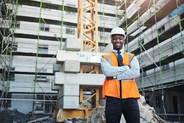 Nothing is too big for our company to build. Portrait of a confident young man working at a construction site.