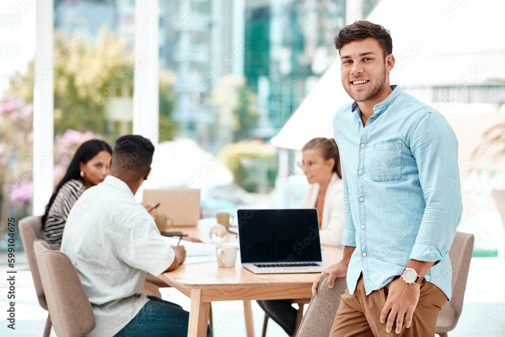 Poster regular meetings keep things running smoothly. cropped portrait of a handsome young man standing in 
