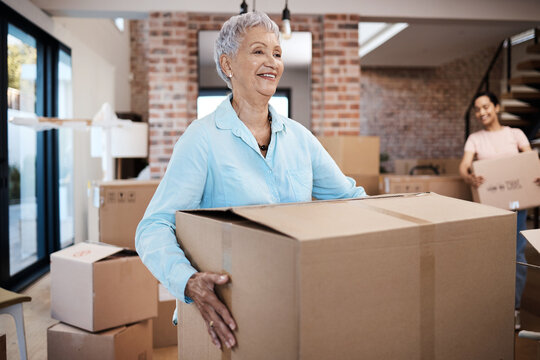 Settling in is going smoothly. a senior woman moving house with help from her daughter.