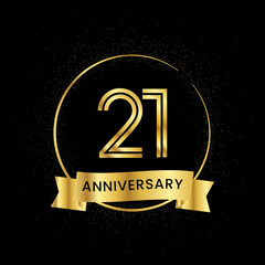 21 years anniversary inside a golden circle and glitter spread on a black background. Golden number anniversary