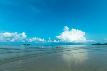 Beautiful beach front view Clear blue sea, blue sky overlooking On a clear day, there are white...