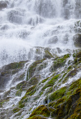 Dynjandi Waterfall Water Texture. Beautiful Pure Nature in Iceland. Powerful Mountain River Background. Huge Water Stream, Infinite Natural Energy. Travel Europe. Go Everywhere. High quality photo.