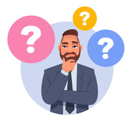 A man surrounded by question bubbles. The man has a question. Portrait of a thoughtful businessman. Smart, thinking guy, problem solver.