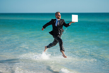 Funny business man in suit on sea. Summer vacation, business on sea beach. Summer rest, business...