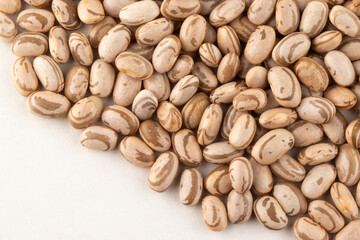 Portion of Brazilian bean isolated on white background. Selective focus.
