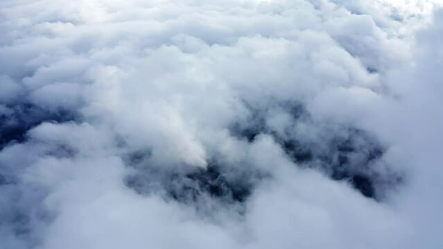 aerial photography mountains clouds