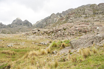 Mountainous rocky landscape in Los Gigantes, a mountain massif that belongs to the northern area of Sierras Grandes, a tourist destination for hiking, trekking, and climbing in Cordoba, Argentina