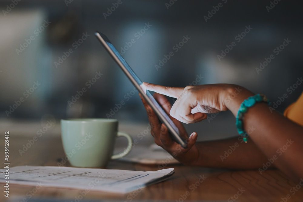 Aufkleber Boosting efficiency with modern tools. Closeup shot of an unrecognisable businesswoman using a digital tablet in an office at night.
