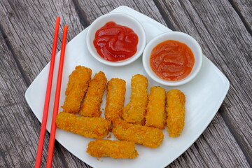 carrot chicken nugget. nuggets are processed products from chicken, beef, fish. fast food. junk food