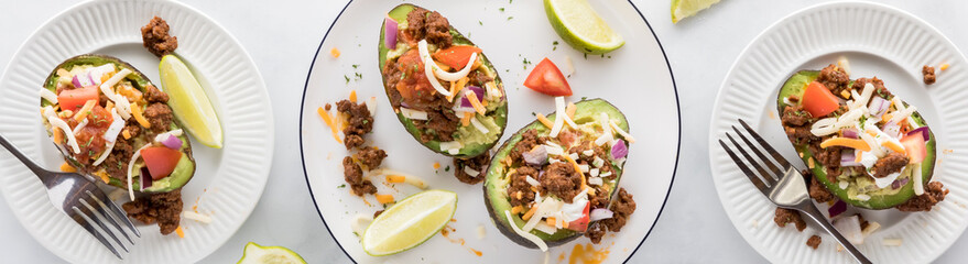 A narrow view of Mexican style avocado boats, ready for eating.