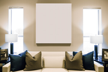 white couch in a living room with a large white canvas. Generative Ai