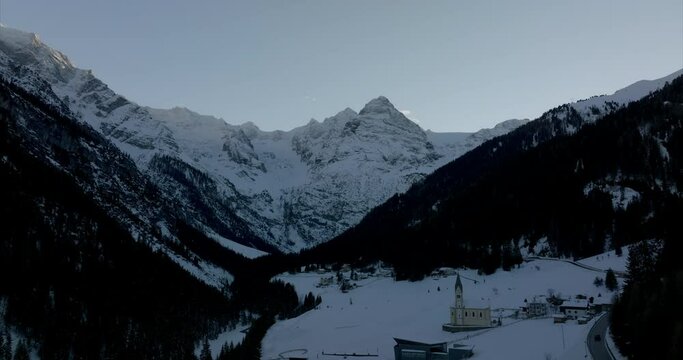 Aerial view of the quaint mountain village, Trafoi, based along the Stelvio Pass road during wintertime.