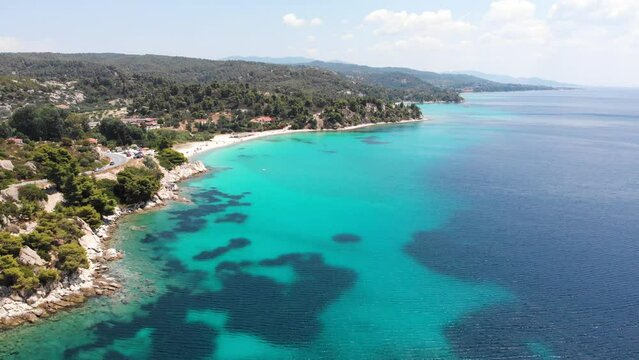 Aerial view on the Koviou beach on the coast of the Sithonia, Greece. Top view from drone.