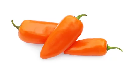 Poster Fresh raw orange hot chili peppers isolated on white © New Africa