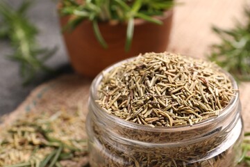 Closeup view of jar with dry rosemary