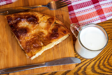 Fresh made chesse pie, preparation for eating...burek sa sirom...peynirli börek...