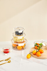 Various vegetables and fruits in glass crisper, indoor kitchen scene, healthy lifestyle